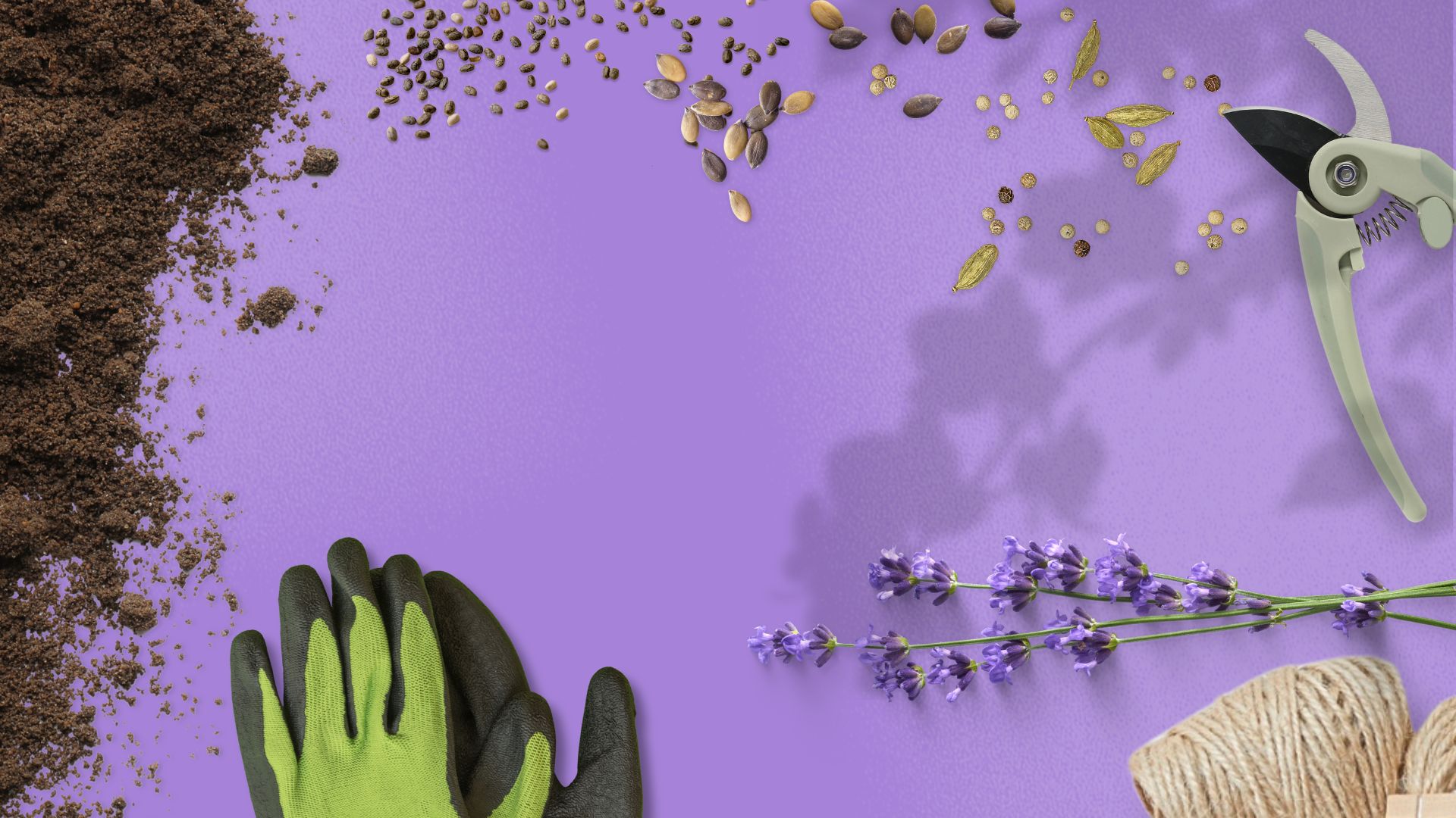 Image d'un plan de travail vu de haut avec un sécateur, des gants, des graines, de la lavande, de la ficelle et de la terre.